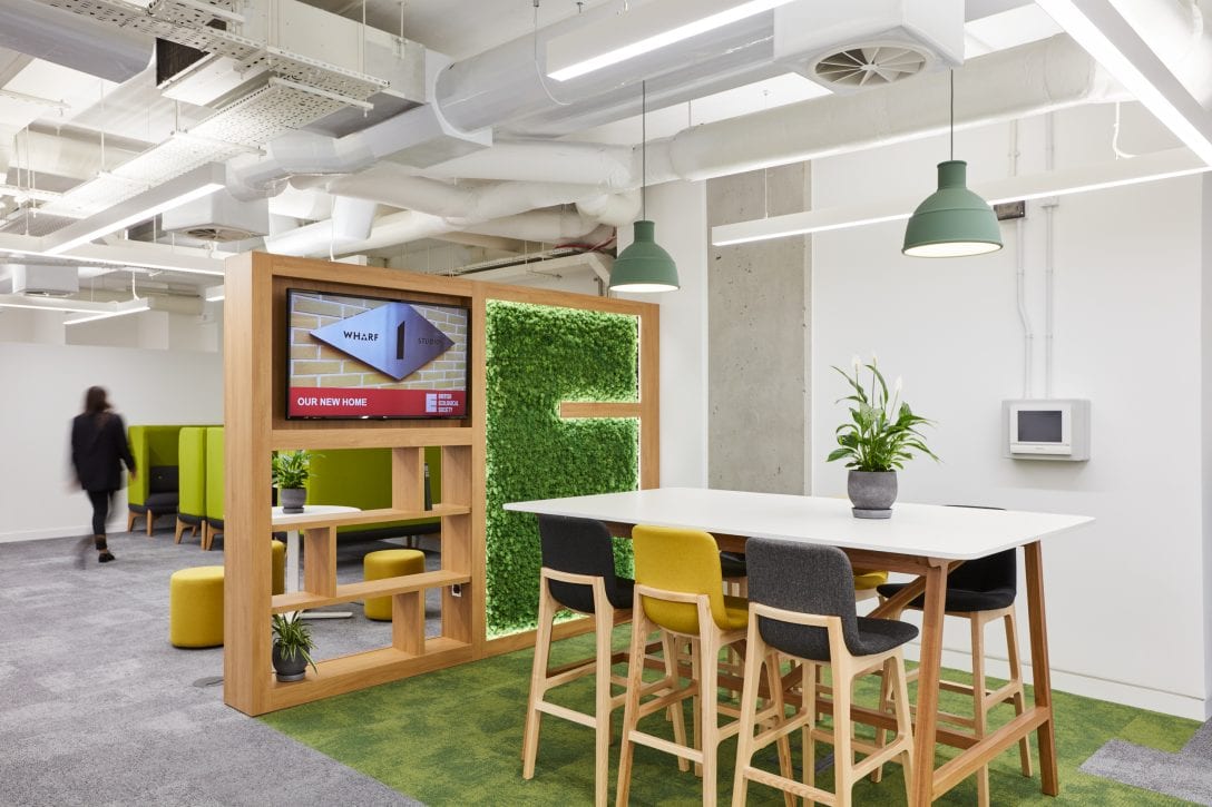 A breakout space within the BES office featuring the BES logo in moss.