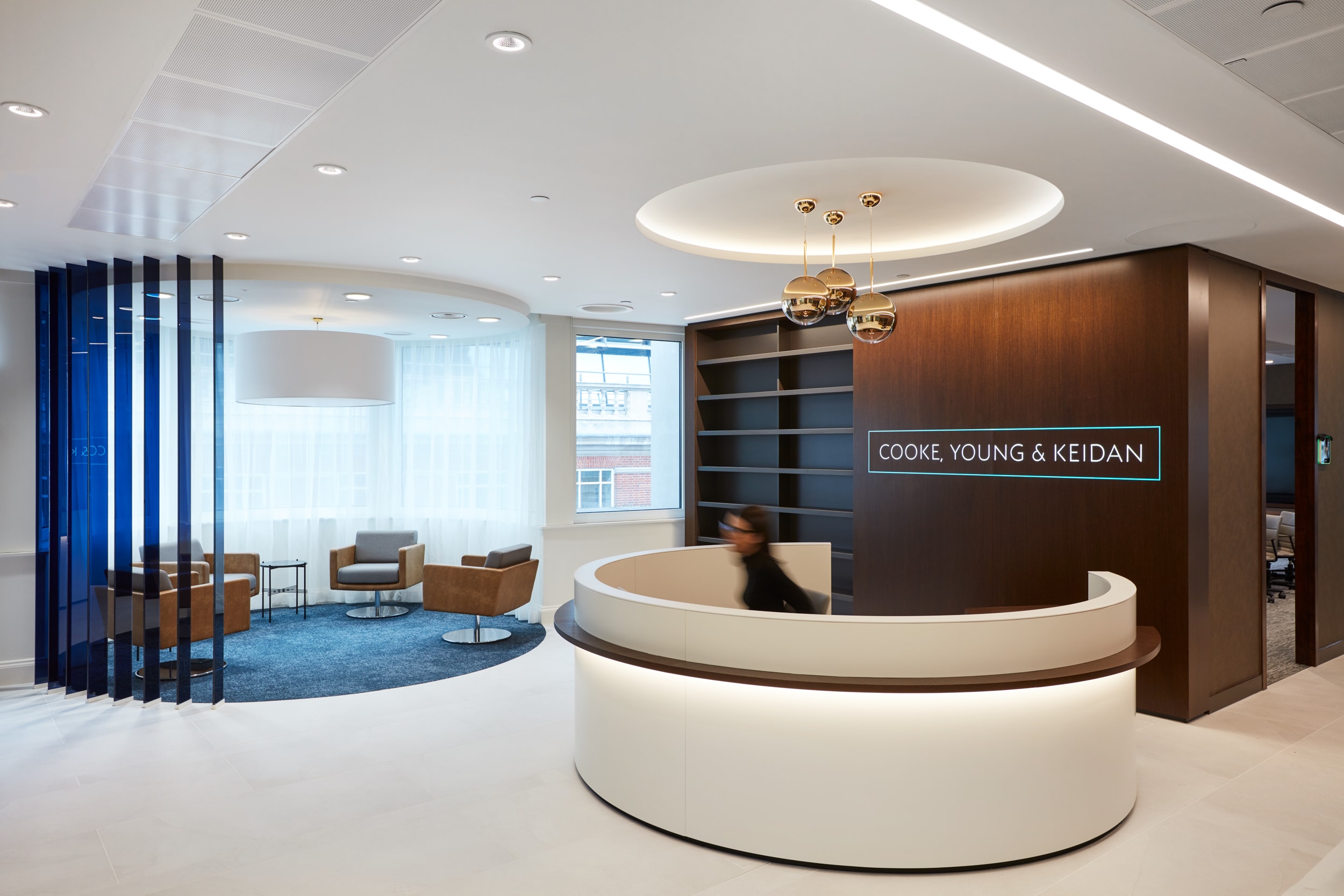 Legal workplace design and build by AIS, main reception area with girl at desk