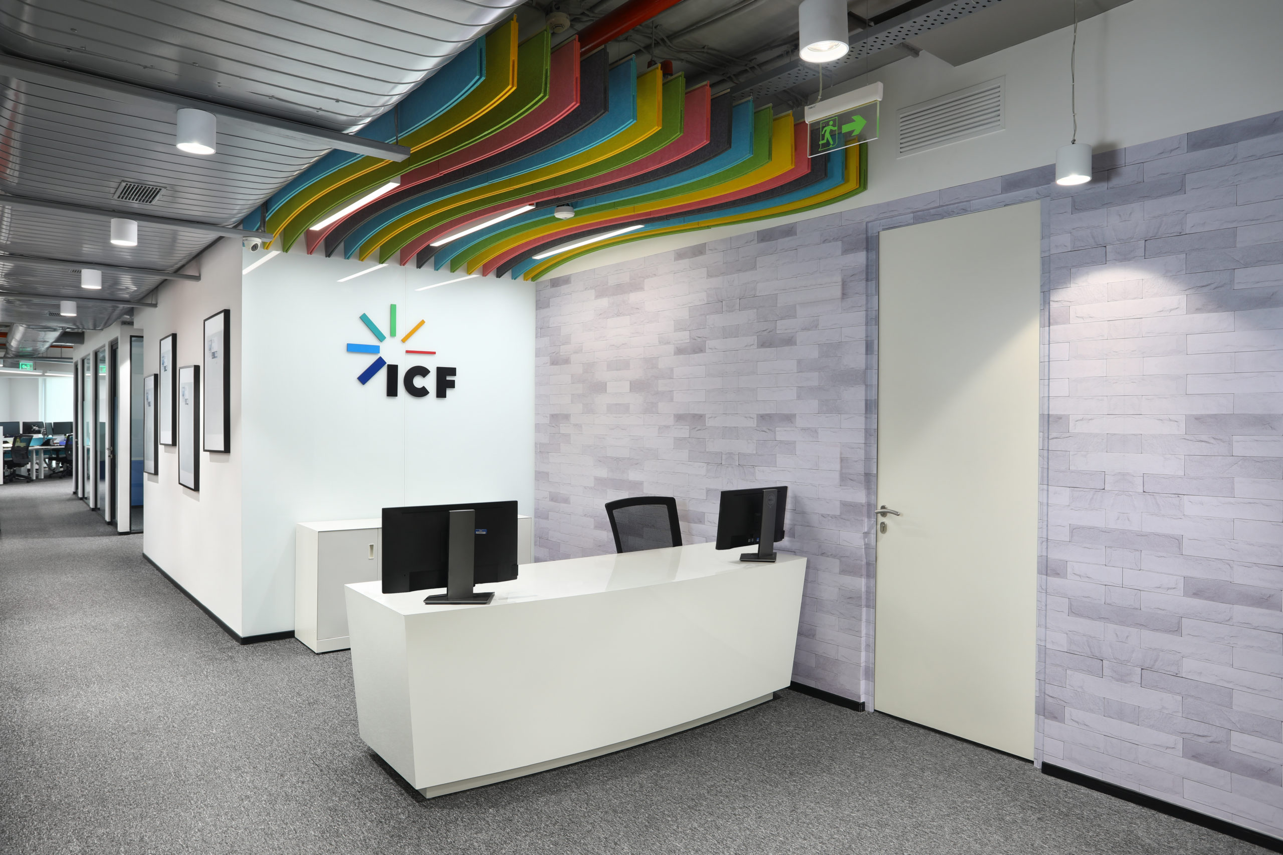 Reception desk with feature ceiling detail inside the ICF office design and build project by AIS.
