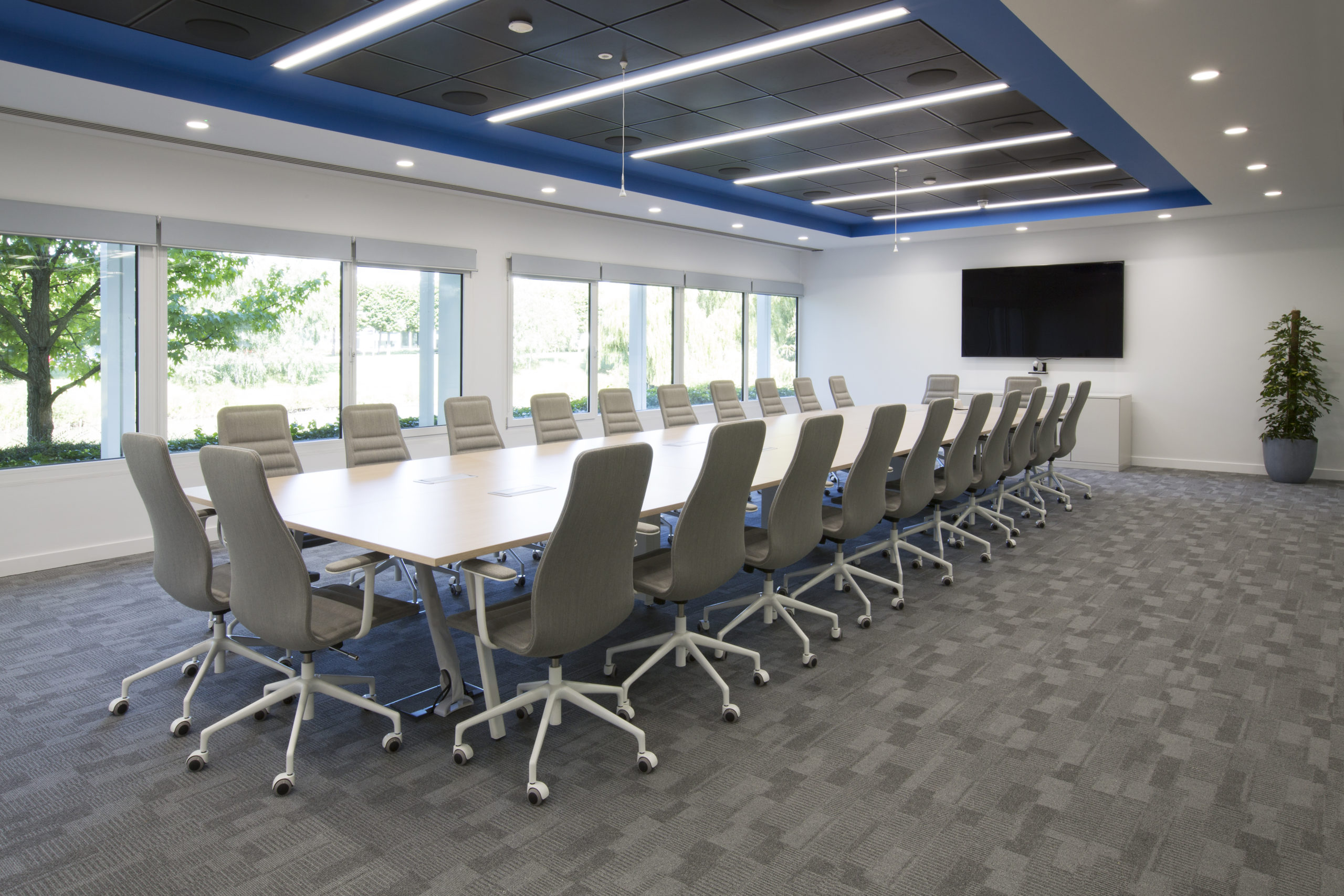 Board room with feature lighting above the long desk at Verifone offices designed by AIS.