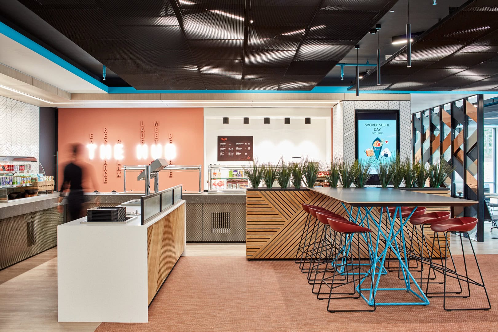 An office canteen exemplifies workplace wellbeing facilities.